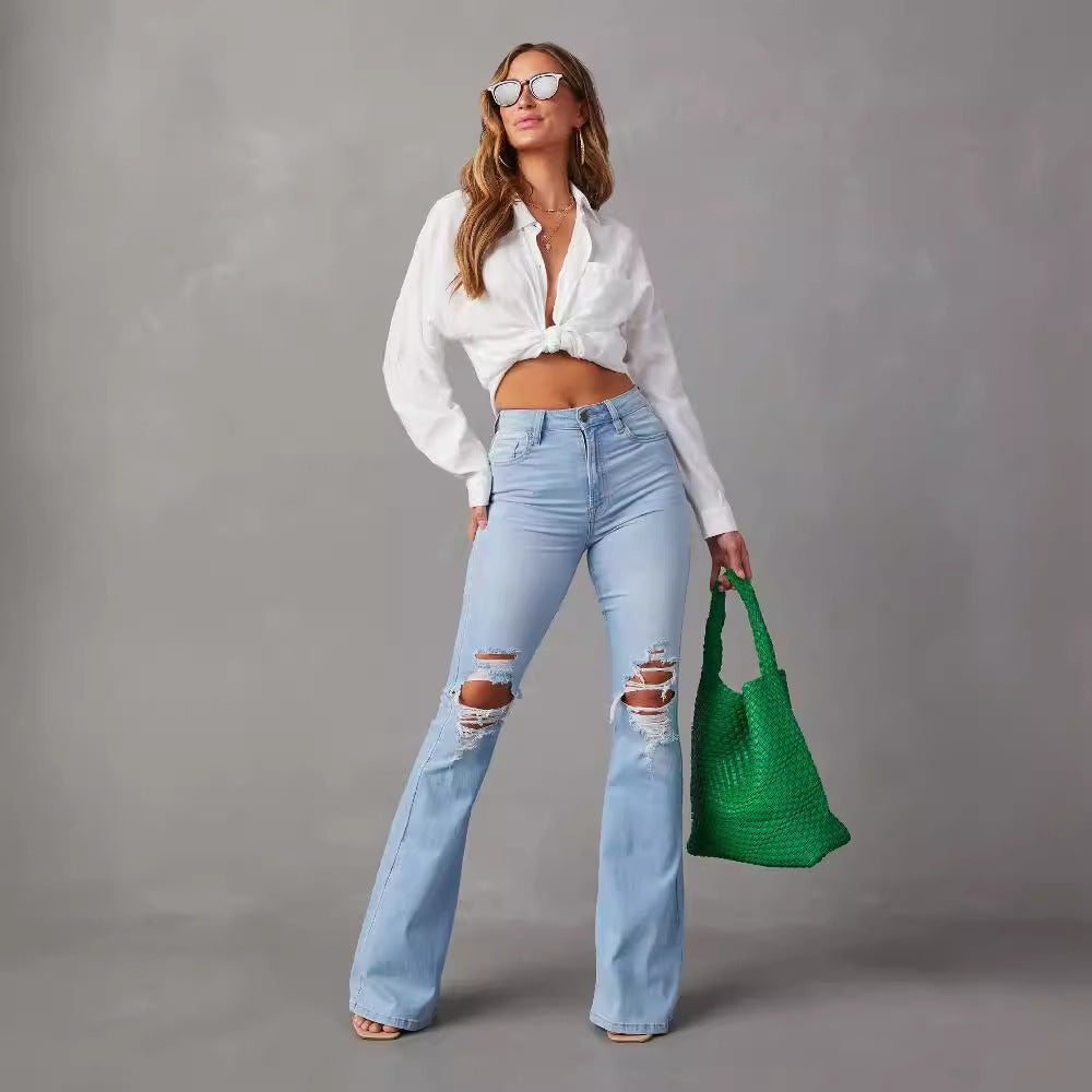 Pantaloni da donna eleganti a gamba larga, a vita alta e strappati, stile cowboy.