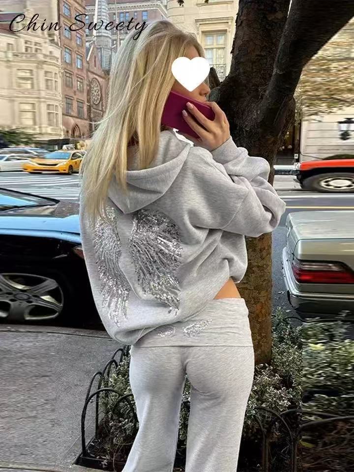 Felpa con cappuccio e pantaloni casual con paillettes e ali in stile dolce e piccante