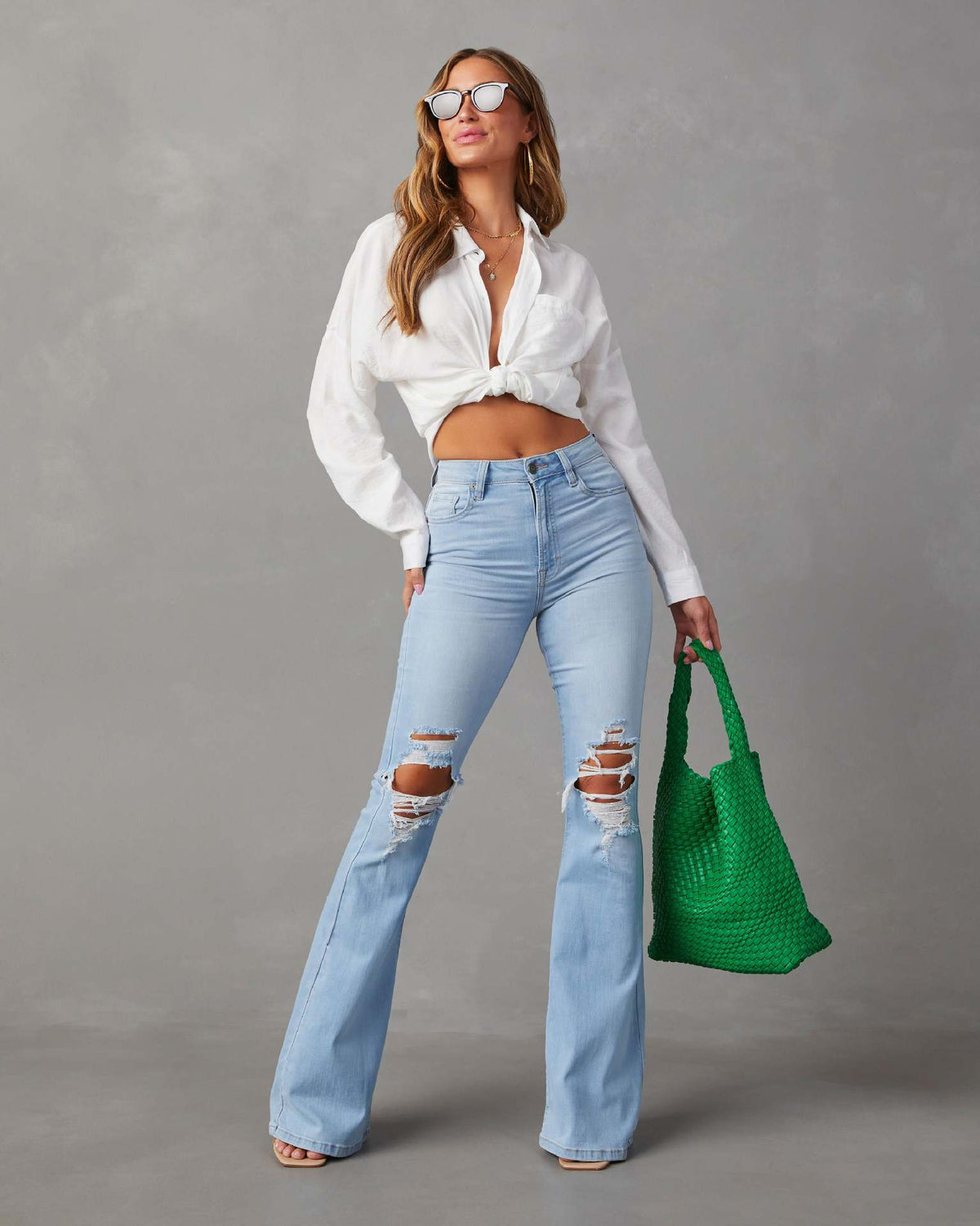 Pantaloni da donna eleganti a gamba larga, a vita alta e strappati, stile cowboy.