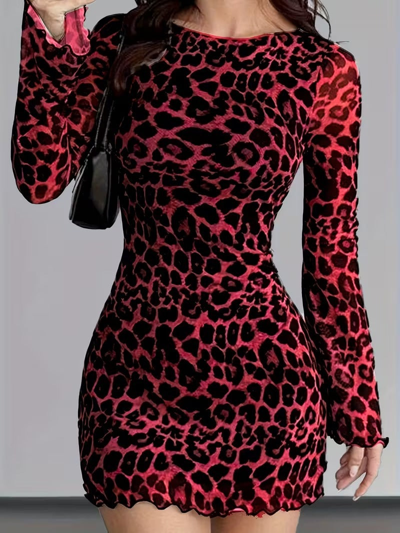 Abito da donna con inserti in rete e stampa leopardata