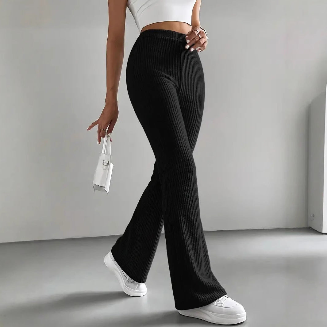 Pantaloni a zampa da donna, pantaloni casual a coste in tinta unita